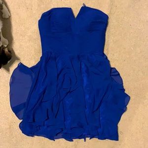 Always been too big on me! Beautiful Royal blue strapless dress!